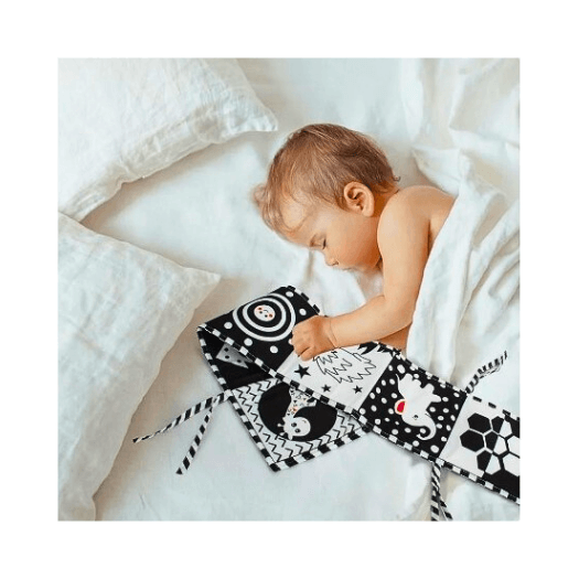 "Invest in your baby's cognitive growth with the Montessori Sensory Book for Babies! Its engaging patterns and double-sided design make playtime a visually stimulating experience."